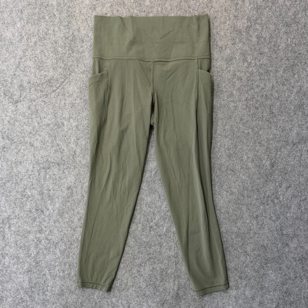 Athleta Olive Green Salutation Stash Mesh 7/8 Tight Leggings Women's Size Small